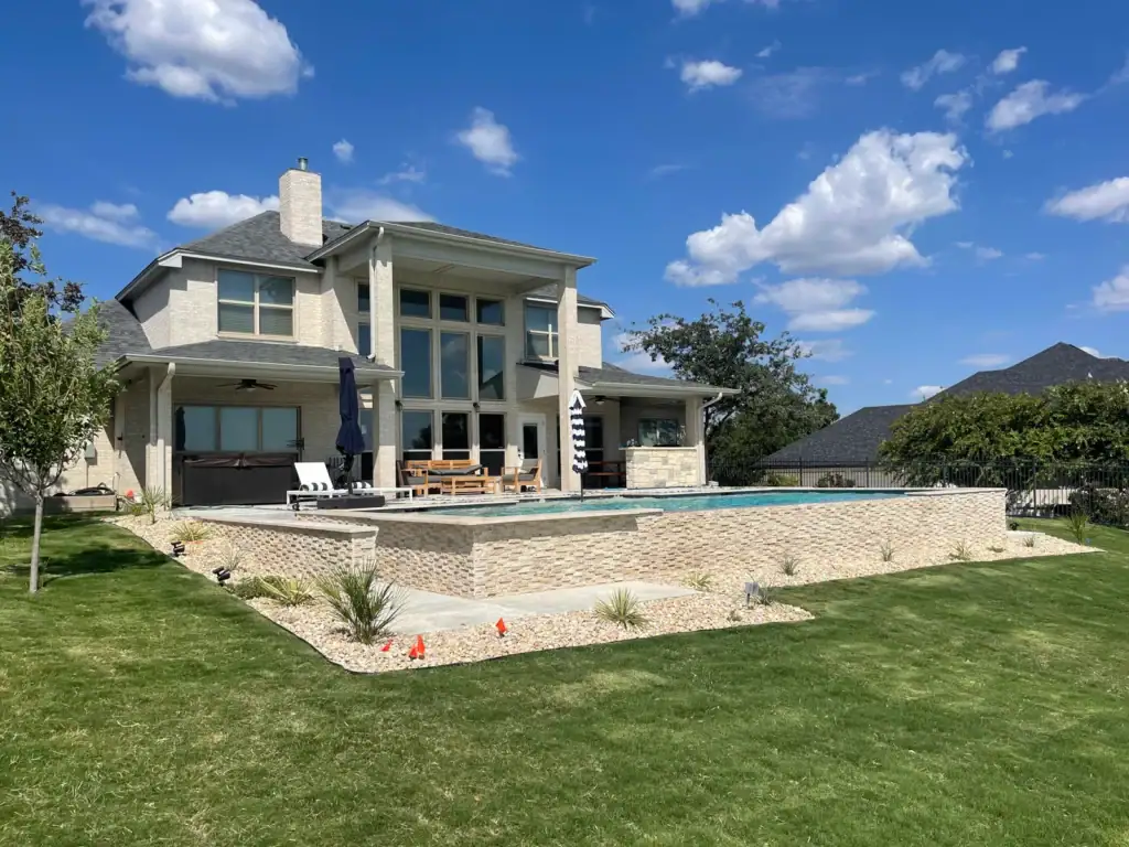 Custom built pool with faux infinity edge pool